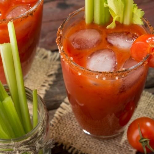 bloody mary with celery in a glass