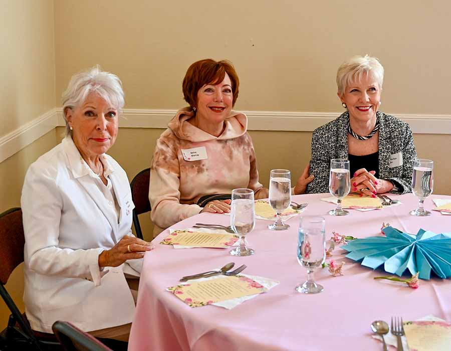 Melinda Horwitz, Betsy Murray, and Marilyn Orr sitting at a table